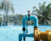 Water,Pumps,Are,Working,Beside,The,Pool.