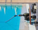 Cleaning pump working with a swimming pool. Horizontal shot